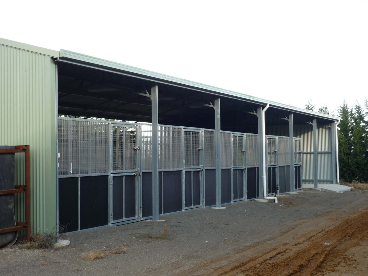 Horse stables with external lockable doors