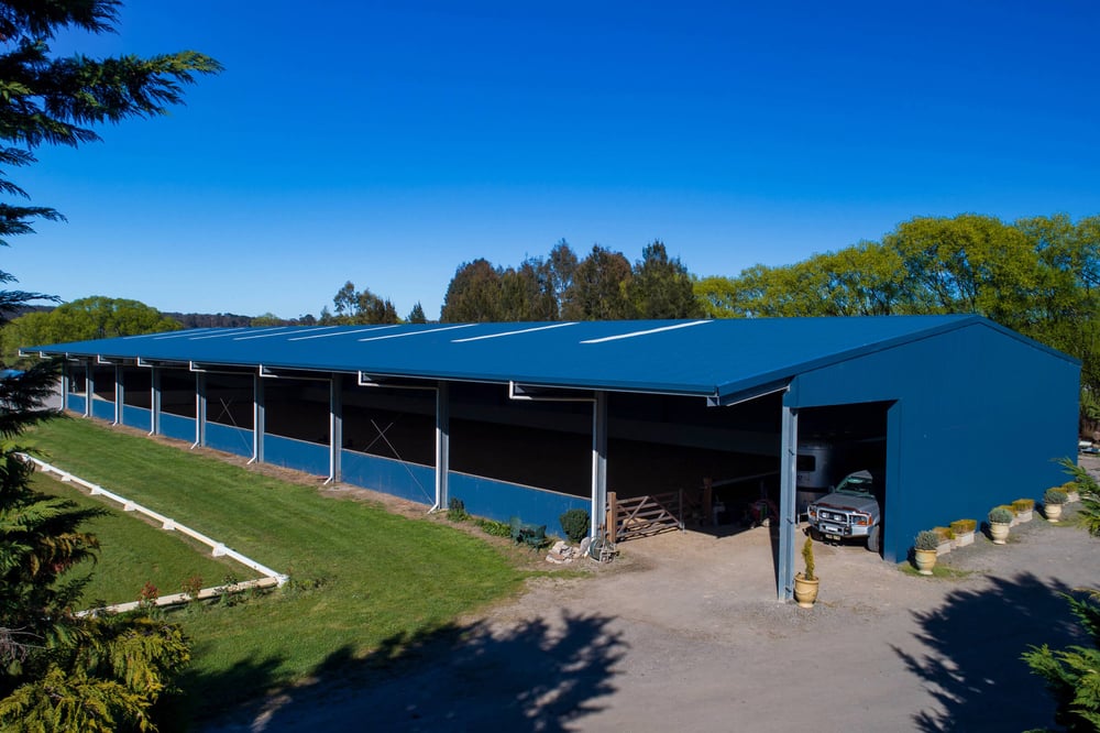 Horse arena with float storage for Glenhill Sporthorses