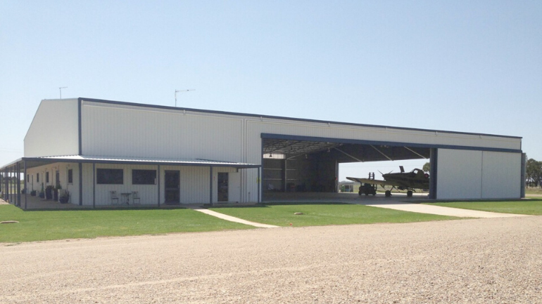 Aircraft hangar with additional office space by ABC Sheds