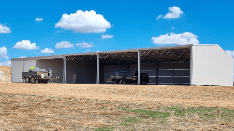 Versatile hay shed