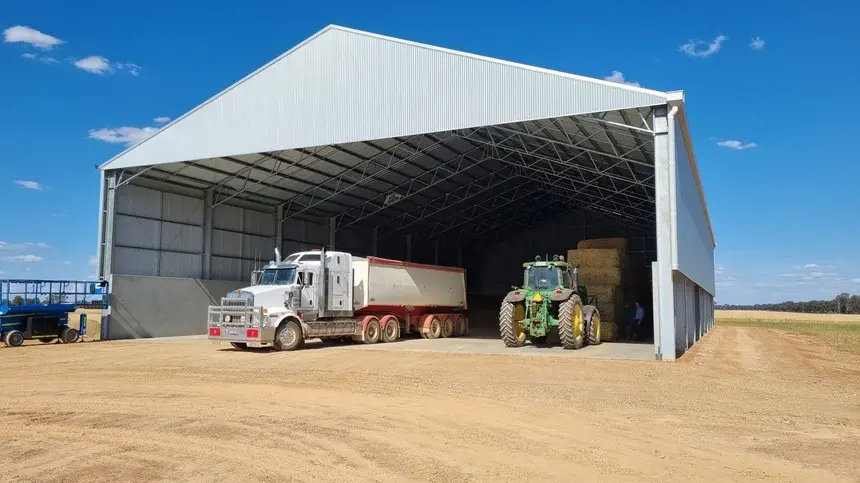 large truck in grain shed