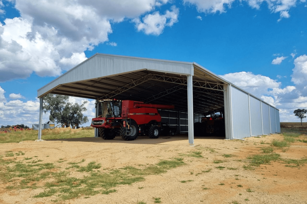 Slanted view of drive-through machinery shed