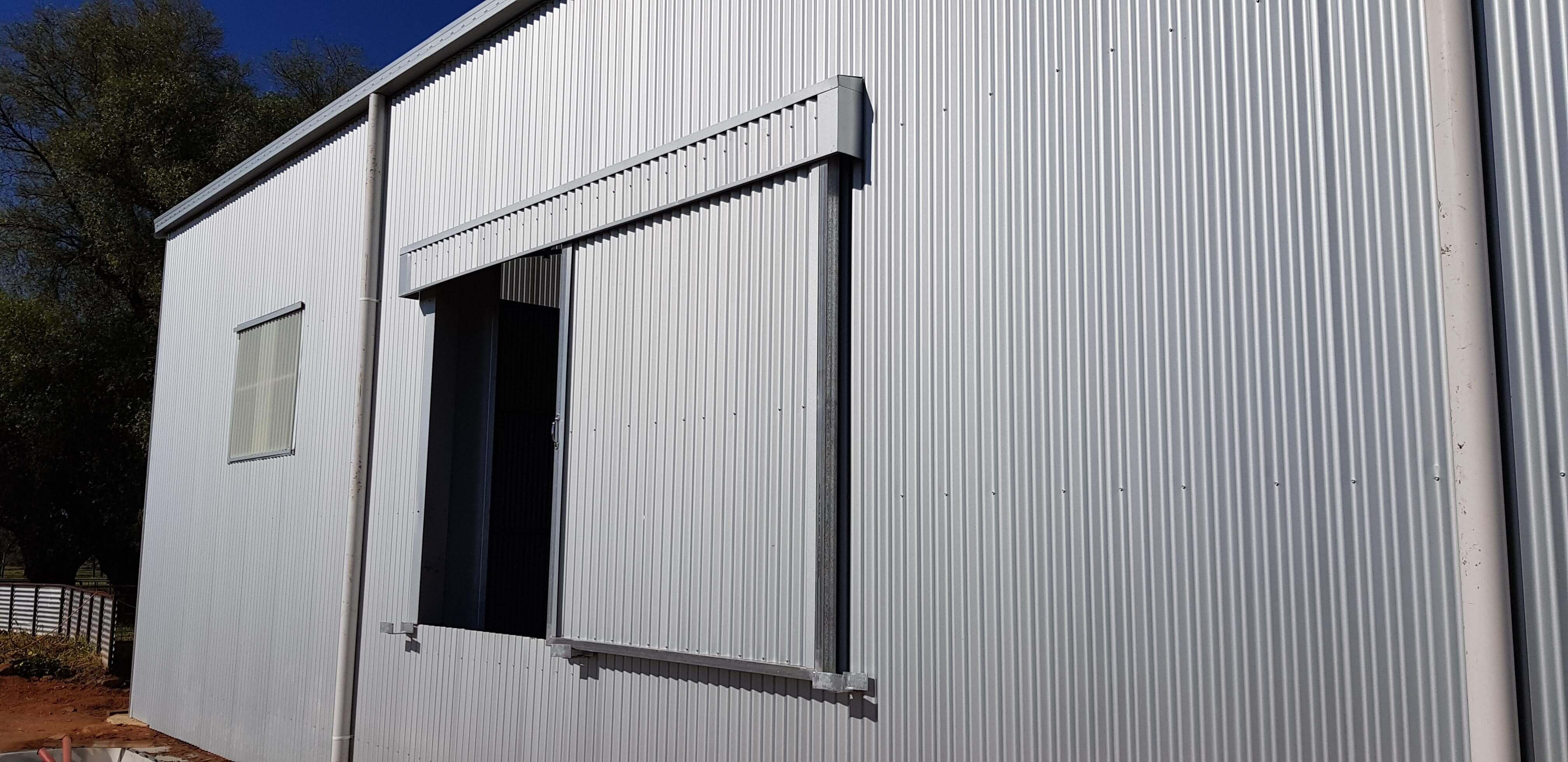 Shearing shed with sliding windows