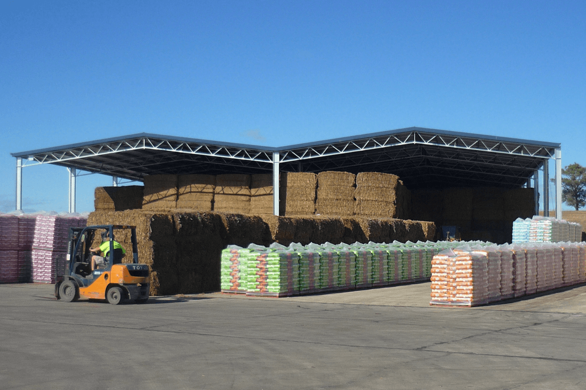 Yass hay shed and hay bales