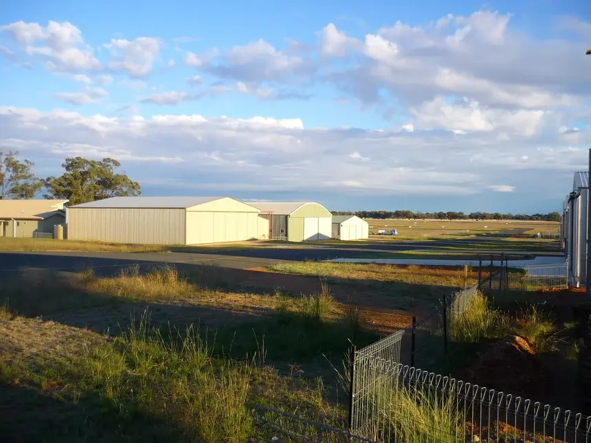 green aircraft hangar in temora